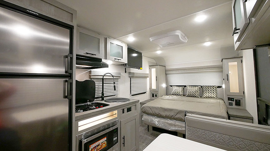 Ibex 19MBH front interior with Murphy bed down.