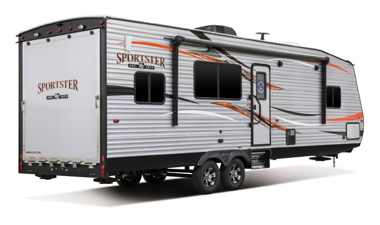 White and orange designed K-Z Sportster fifth wheel trailer