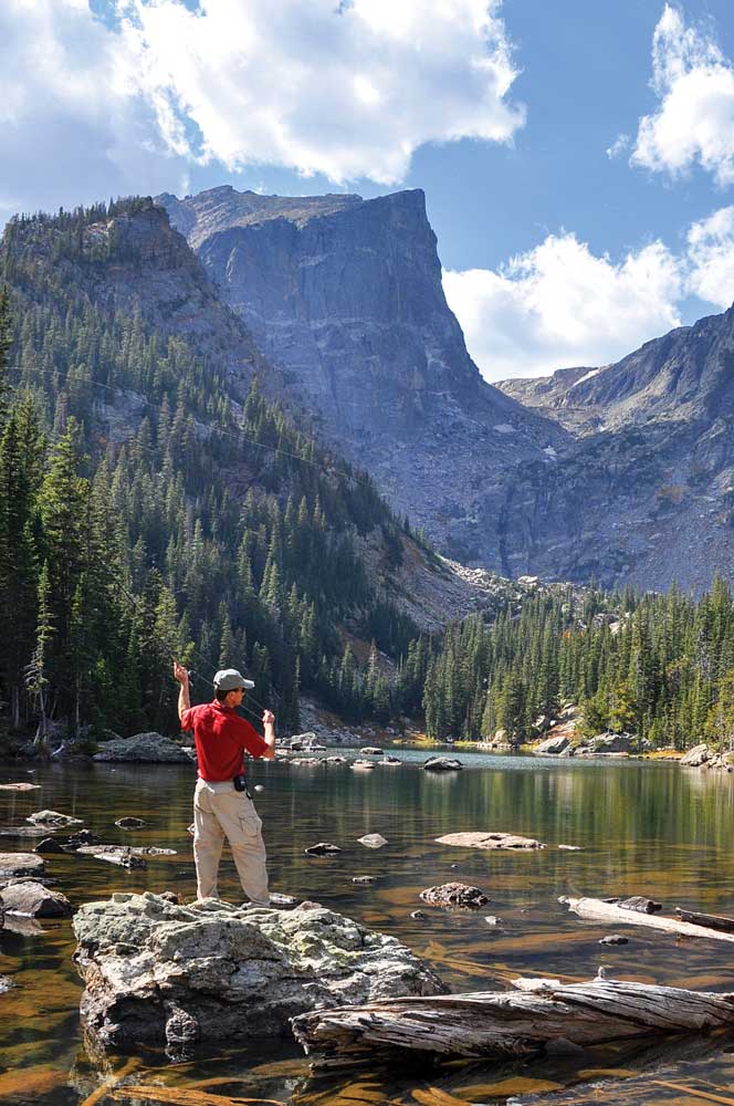 n angler casts for rare greenback cutthroat trout in Dream Lake. 