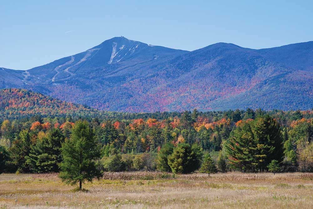 Whiteface, the 4,865-foot Olympic mountain, wears a skirt of colorful fall foliage.
