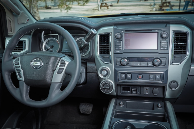 The Nissan Titan cockpit comes fully loaded and takes advantage of the latest electronics, including a backup camera for hitching the trailer. 