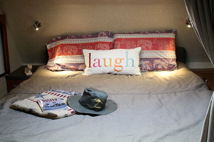 Lance 855s truck camper queen bed.