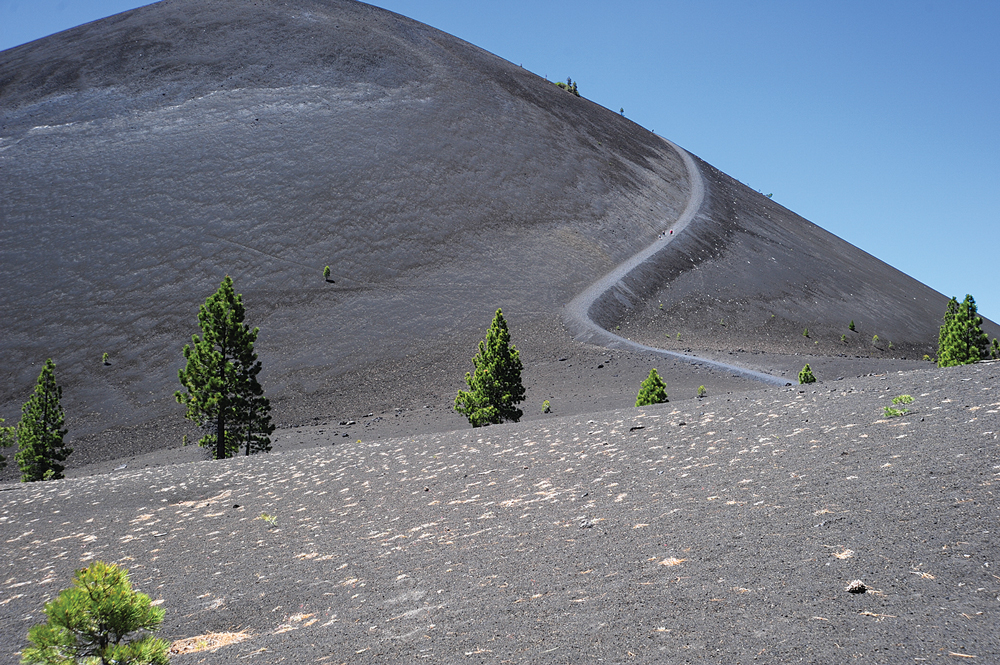 The Cinder Cone Nature Trail, with its trailhead at Butte Lake Campground, ends with  a 750-foot ascent. In hot weather, take water and have a picnic lunch at the base. 