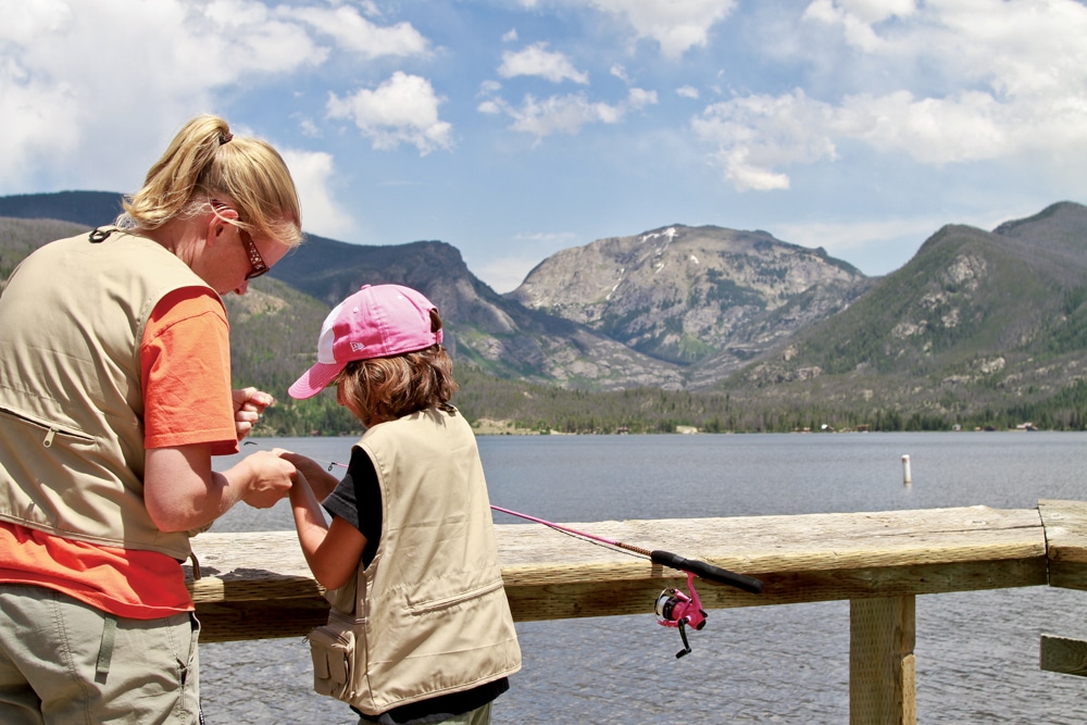 Cleaning fish catch with kids.