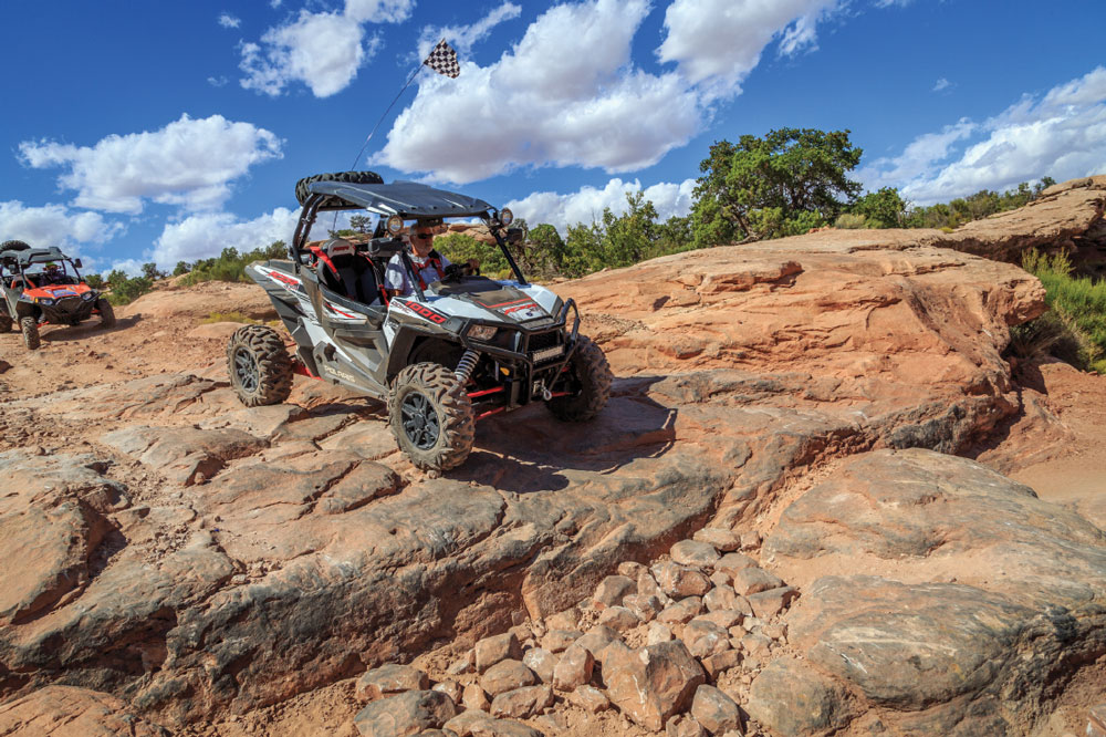 Off-roaders enjoy miles of trails near Moab. The author’s brother-in-law, Mike, skillfully leads the way down the rocks.