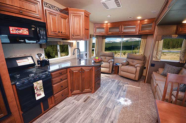 Living and kitchen area of Northwood Arctic Fox 29-5T RV