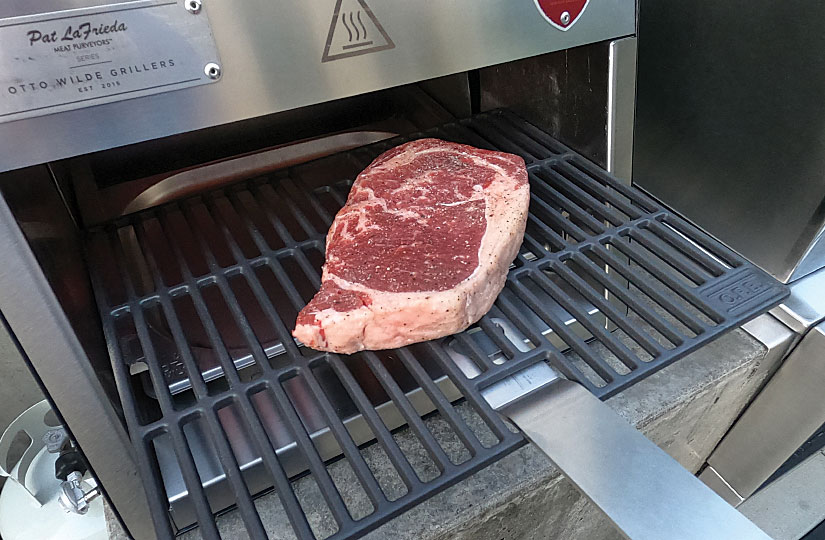 Loading a Steak on the Otto Grill