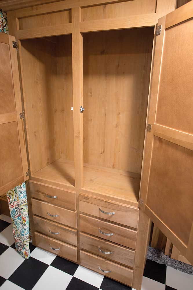 A roomy hallway wardrobe supplements the bedroom closets.