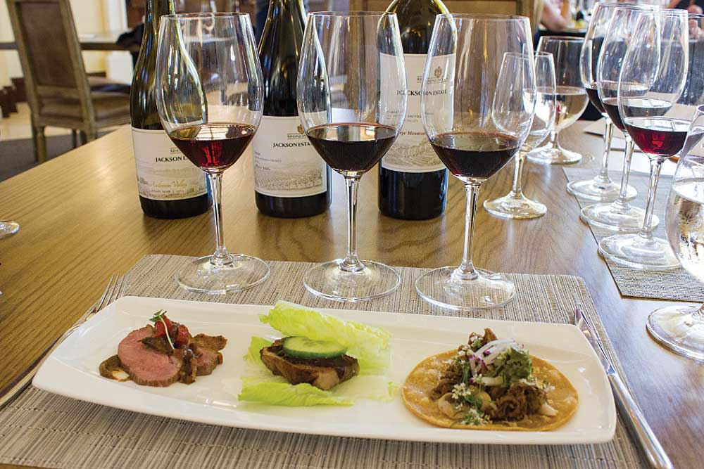 Wine and food pairing at Kendall-Jackson included three items served with red wines: pinot noir with duck breast, syrah with pork belly sliders and cabernet sauvignon with lamb tacos.