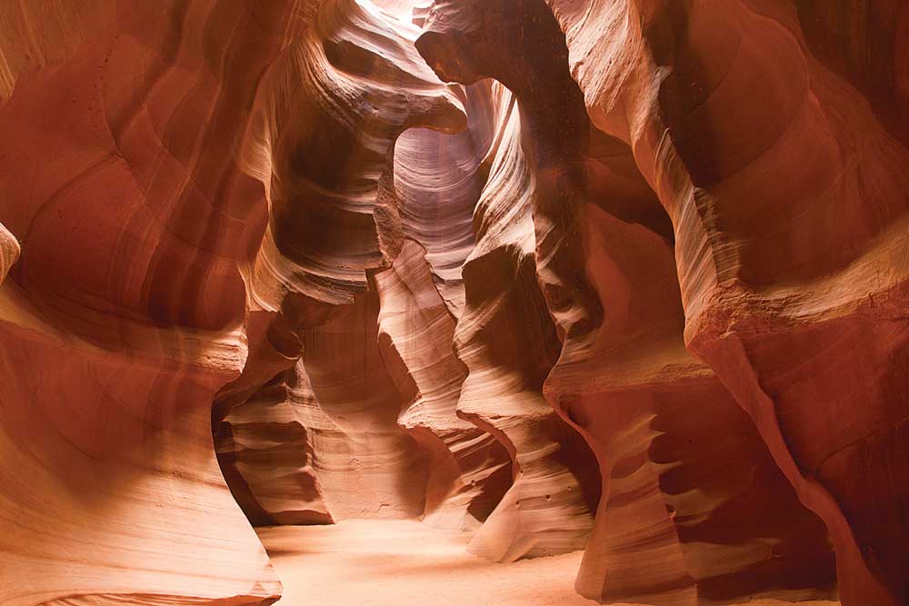 Light dance off the walls of Antelope Canyon n Navajo land east of Page in northern Arizona on a RV visit to southern Utah.