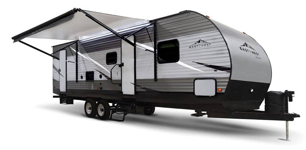East to West Silver Lake 27K2D travel trailer exterior with 15-foot awning out