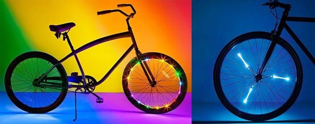 Two bikes with lights on spokes and wheels