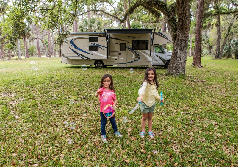 Children playing at a motorhome campsite