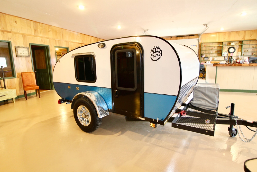 White and blue designed teardrop camper inside