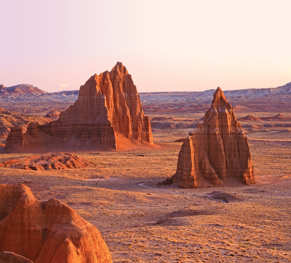 In the Cathedral Valley District of the park are sculptured monoliths named the Temple of the Sun and the Temple of the Moon. 
