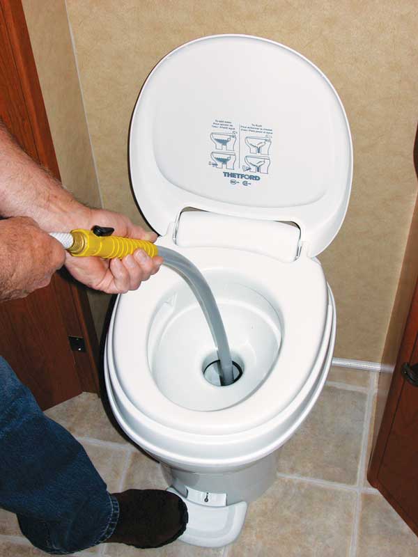 Using a tank wand on RV toilet
