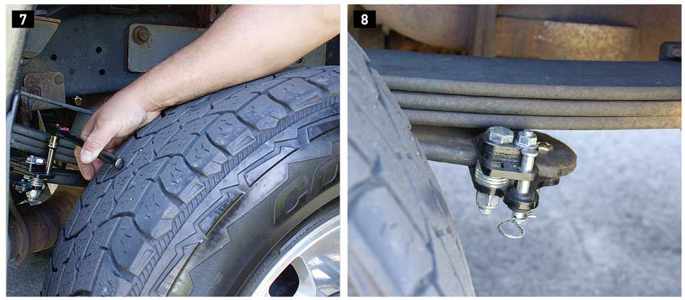 7) A 3/8-inch ratchet and extension are used to engage the Quick Disconnect stabilizer. 8) A clip and pin keep it in place in the engaged position.