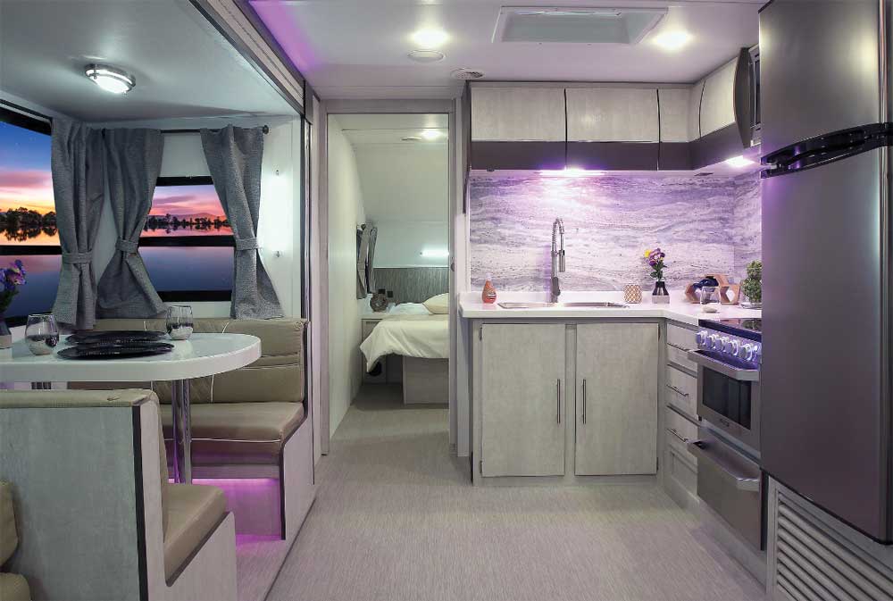 Travel Lite Evoke Model B interior, kitchen with nice lavender lighting
