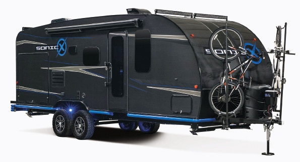 Side view of black Sonic-X travel trailer prototype.