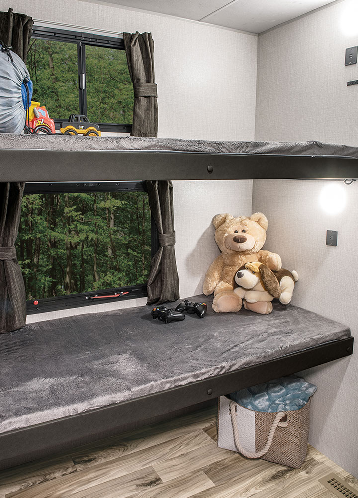 Venture RV SportTrek ST342VMB bunk room with teddy bears on bunks