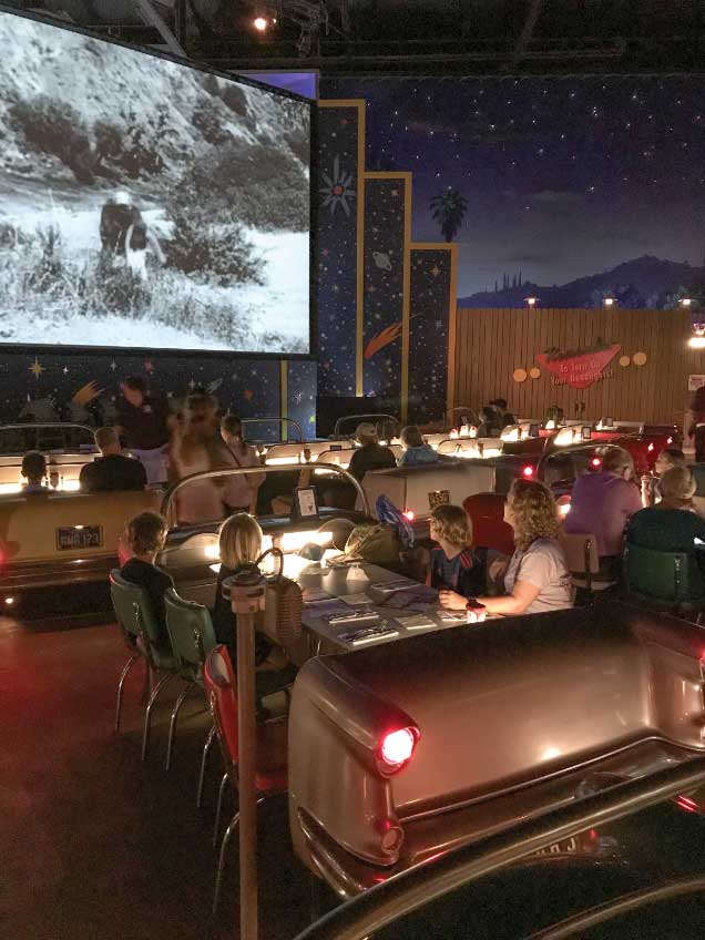 Disney’s Hollywood Studios: Enjoying burgers and classic movie clips at the Sci-Fi Dine-In Theater Restaurant.