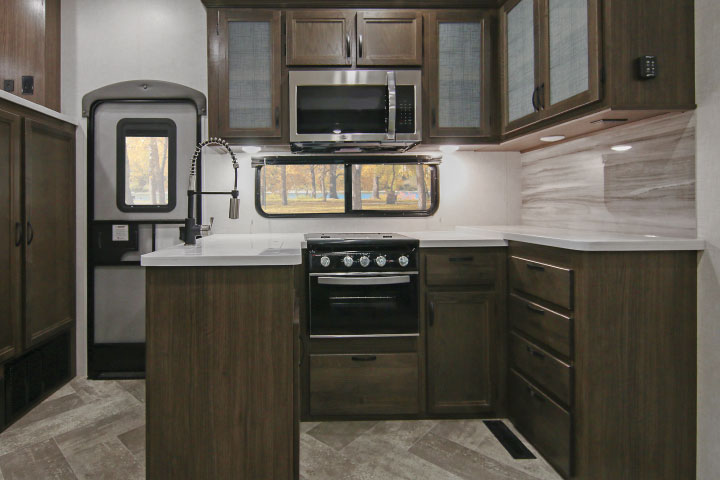 Winnebago Voyage V3436FL fifth-wheel's U-shaped kitchen