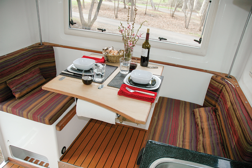 A large dinette in the rear is comfortable for two and big enough for company.