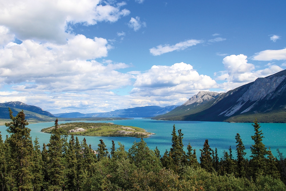Canada’s Tagish Lake has two arms, Taku Arm in the east and Windy Arm in the west. The Klondike Highway runs along Windy Arm, south of Carcross, Yukon Territory.