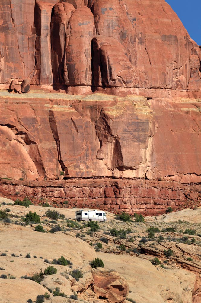 A motorhome drives along the steep start of the park road.