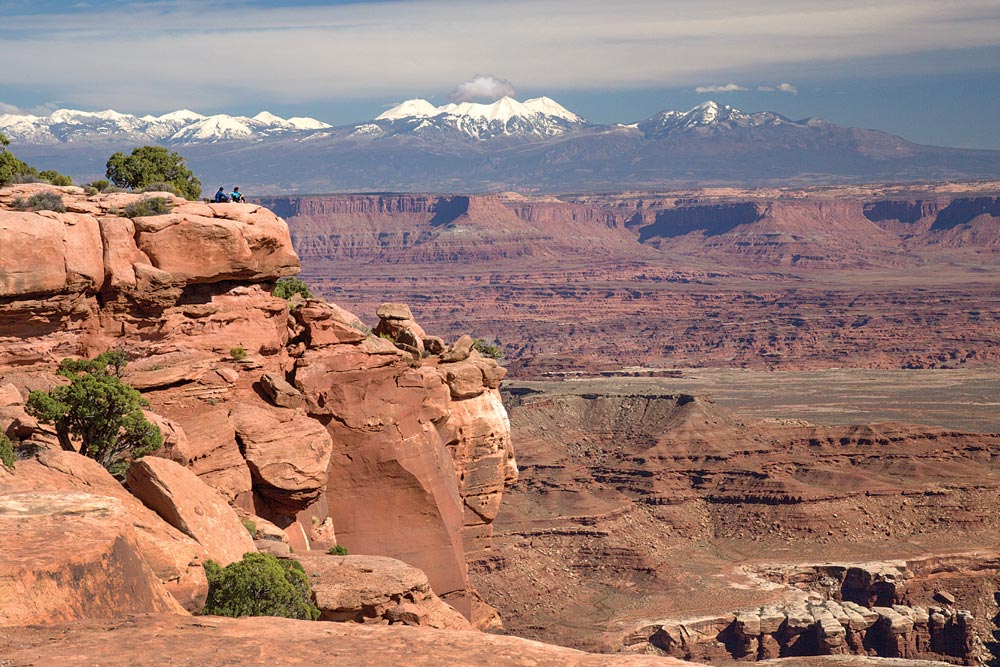 There’s a reason this overlook from the Island in the Sky section of Canyonlands NP is named Grand View Point. The White Rim in the lower right is made of ancient coastal sand dunes and lies 1,300 feet below the overlook; far below the rim the Colorado River continues to carve the canyon. In the distance are the La Sal Mountains, whose highest peak is 12,721-foot Mount Peale.