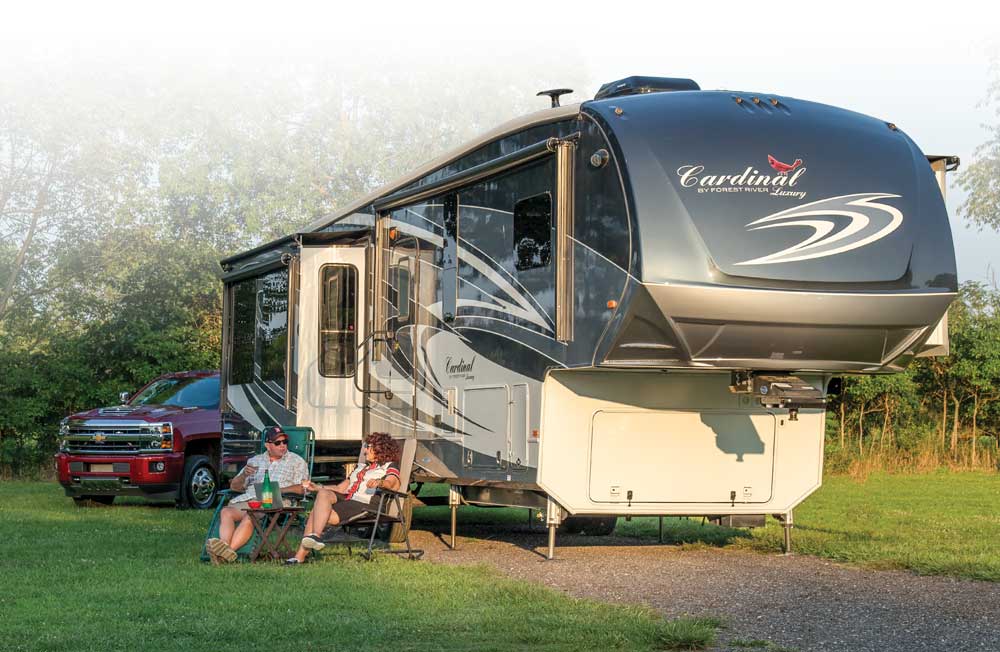 Deborah Hirschy and Scott De Ladurantaye of North Fort Myers, Florida, who were visiting Elkhart, Indiana, the RV capital, for the first time, joined us one evening outside the Cardinal Luxury.