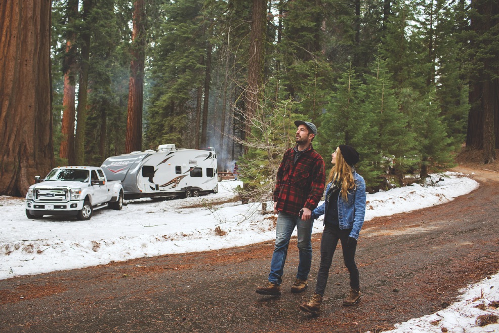 Camping Couple walking in forest