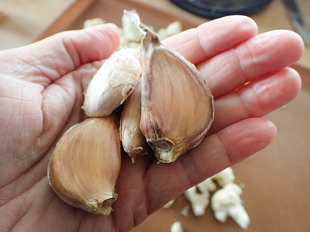 Garlic heads contain several cloves, each wrapped in a protective covering.