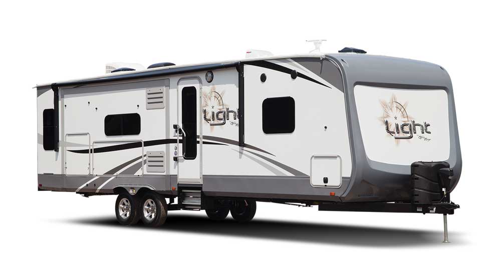 White and grey Highland Ridge Light fifth wheel