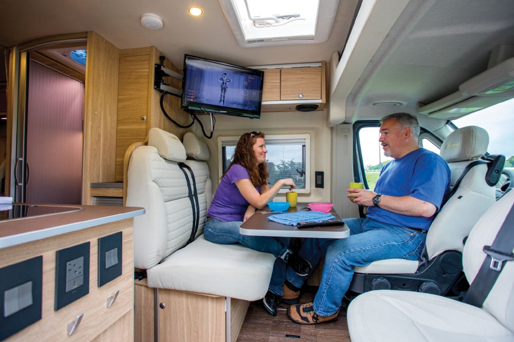 Hymer Aktiv interior with drivers side seat reversed for dinette table