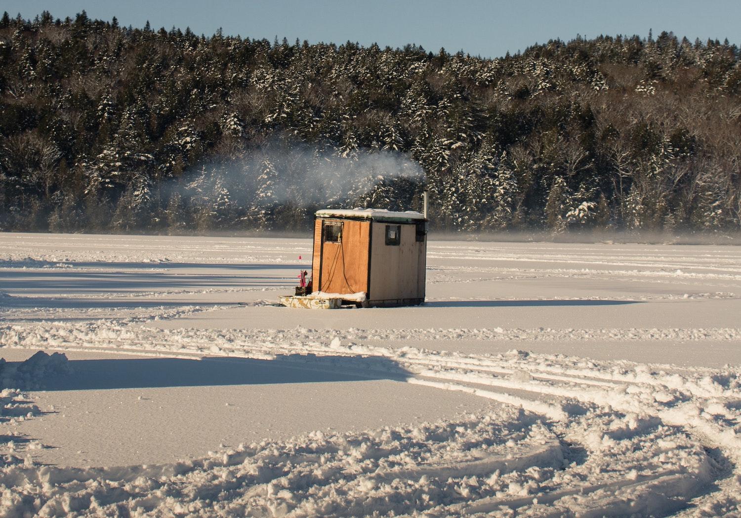 An ice house on a lake