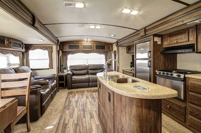 RV living area with nice kitchen area and couches