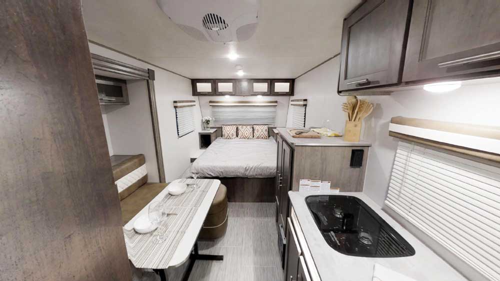 Wood-grain laminate flooring, stainless-steel appliances and hardwood cabinet doors with satin-nickel hardware give the rugged NB19.5 an upscale ambience inside.