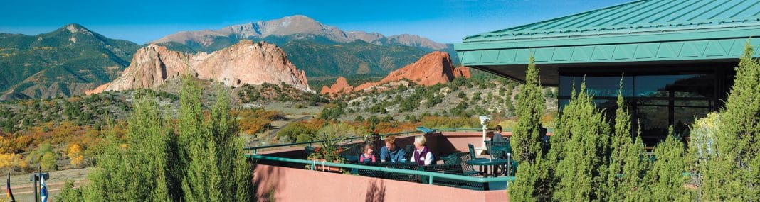 Take in 360-degree breathtaking views of 300-foot sandstone rock formations from the terrace at Garden of the Gods Visitor and Nature Center.