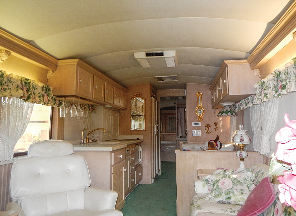 Victorian frills and lighter surfaces made the Prevost conversion's old interior seem too dated for the Elliotts.