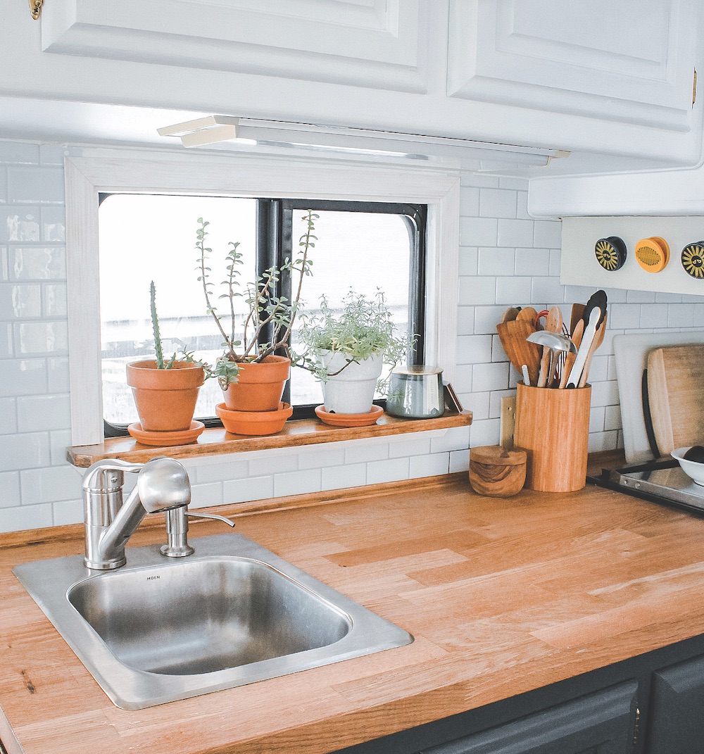 rv remodeled kitchen with peel and stick backsplash