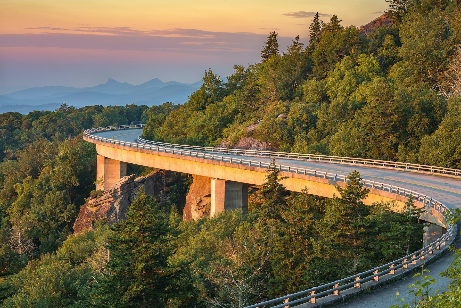 morning light spills out on the Lynn Cove viaduct along the Blue Ridge Parkway in North Carolina.