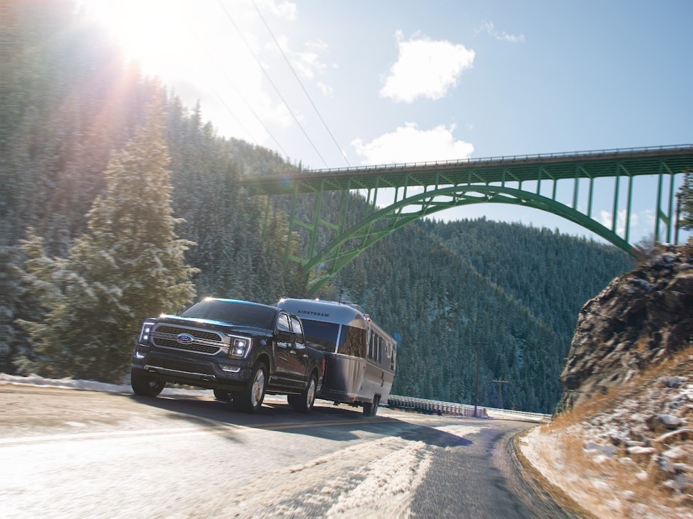 Ford F-150 towing an airstream travel trailer