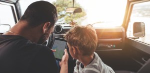 father-son-mapping-road-trip