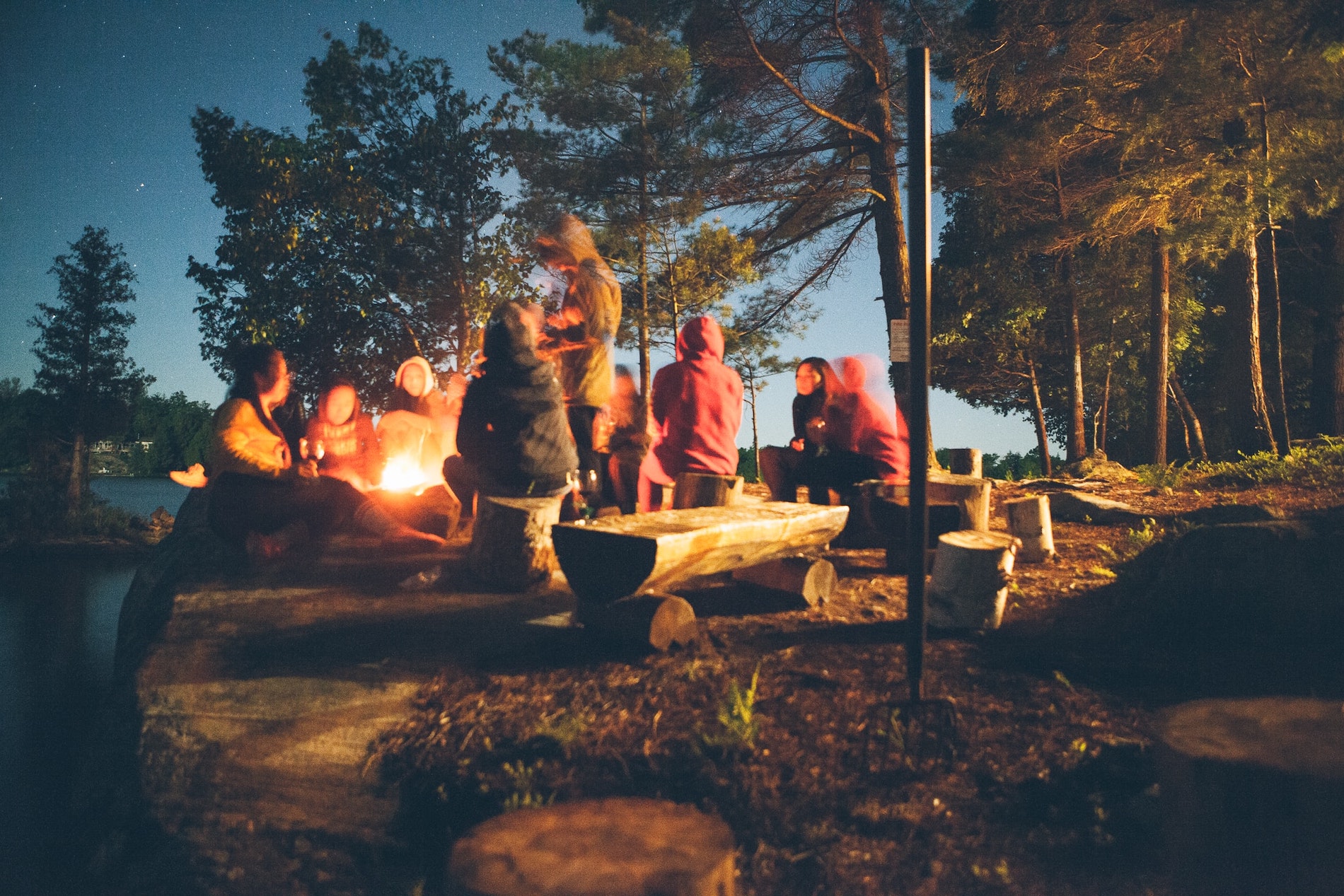 camping kids around a fire