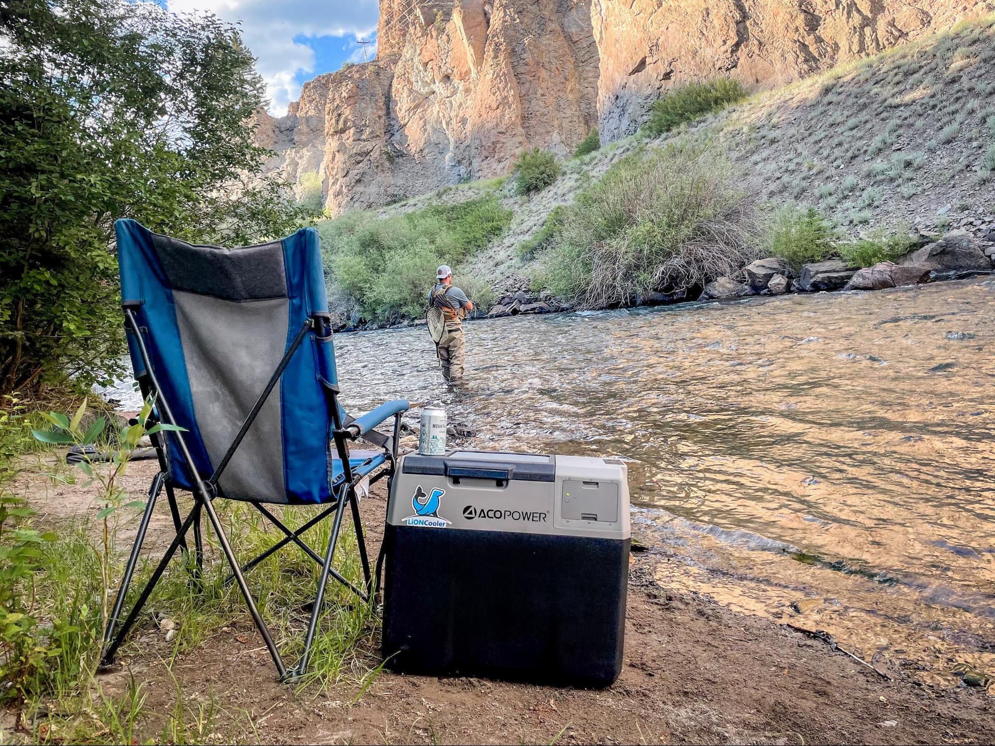 LionCooler X40A Portable Fridge Freezer Cooler by ACOPower next to a camp chair