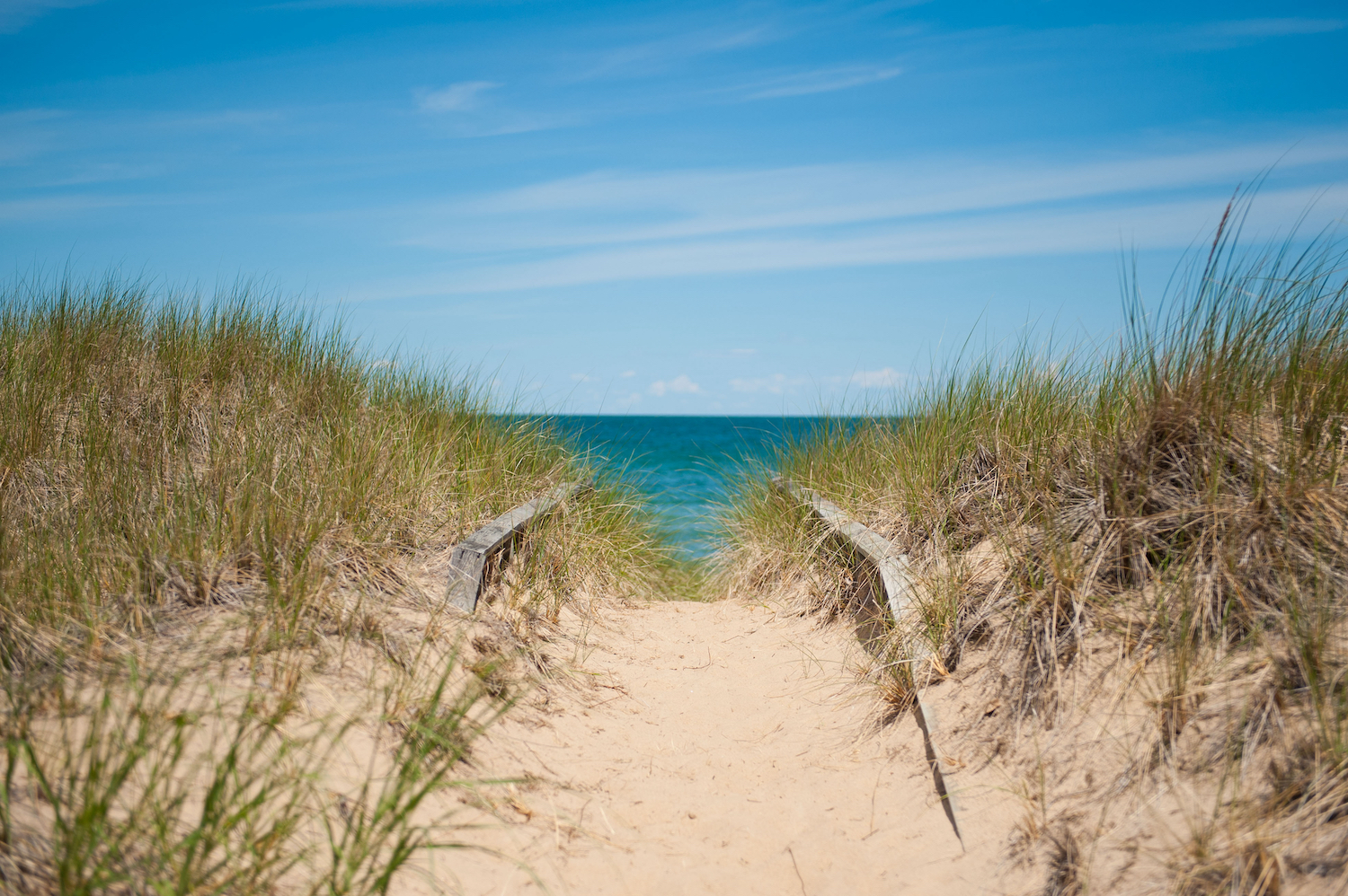 Port Austin, Michigan, United States - July 7th 2016: A view of the beach and the lake where Saginaw Bay and Lake Huron meet at Port Crescent State Park.