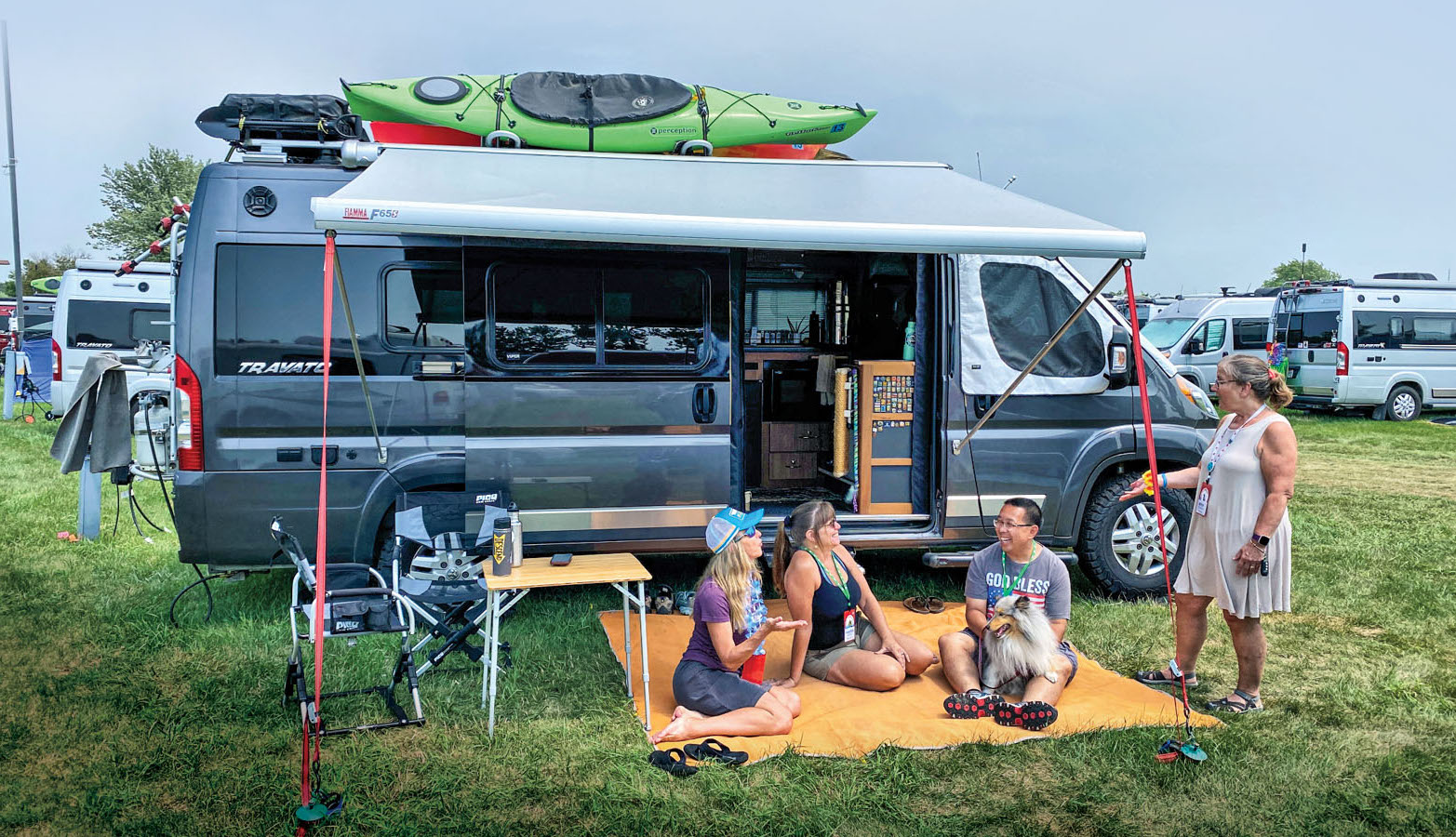 Social Gathering in Front of Camper