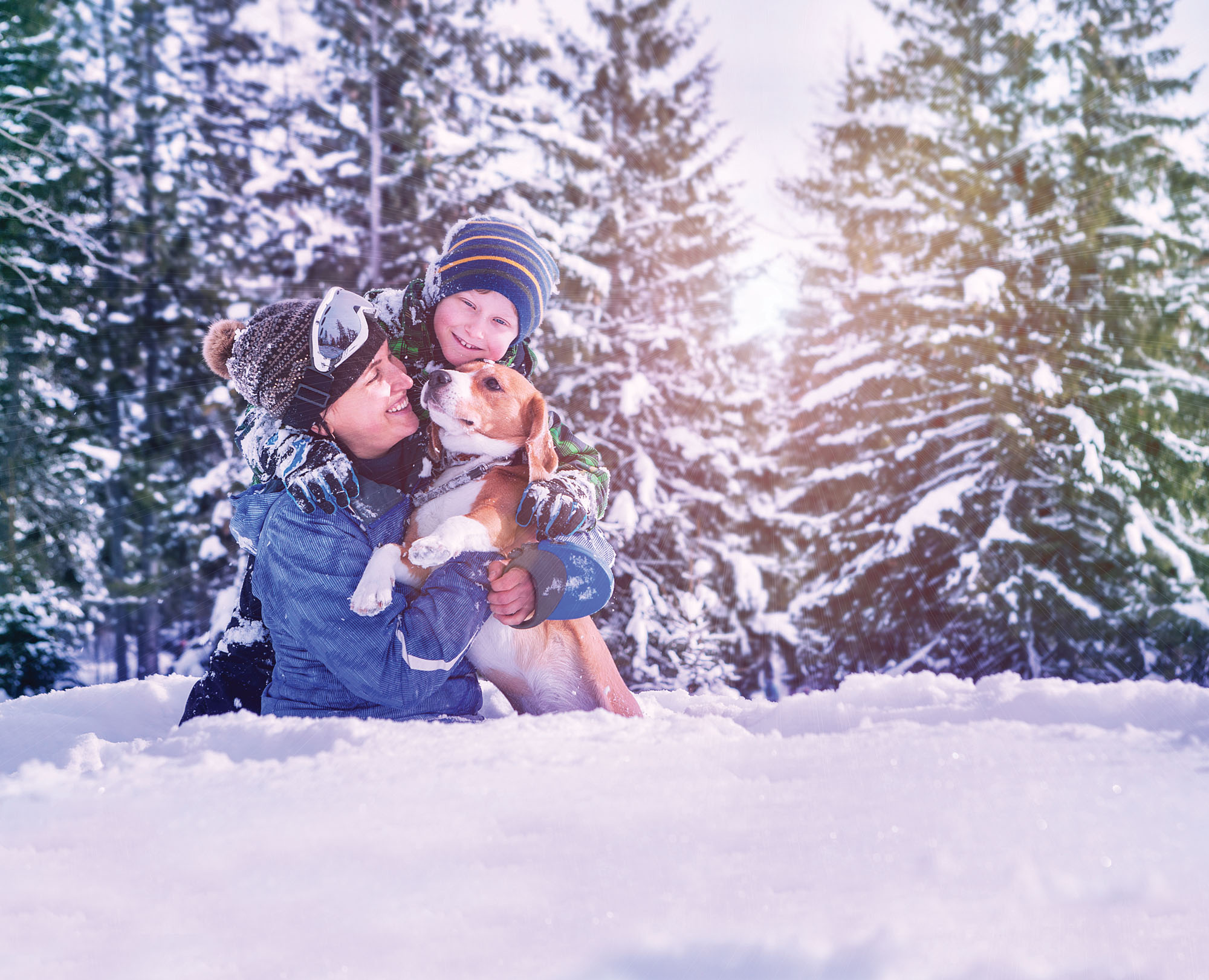 Mother, Son, and Dog in Snow