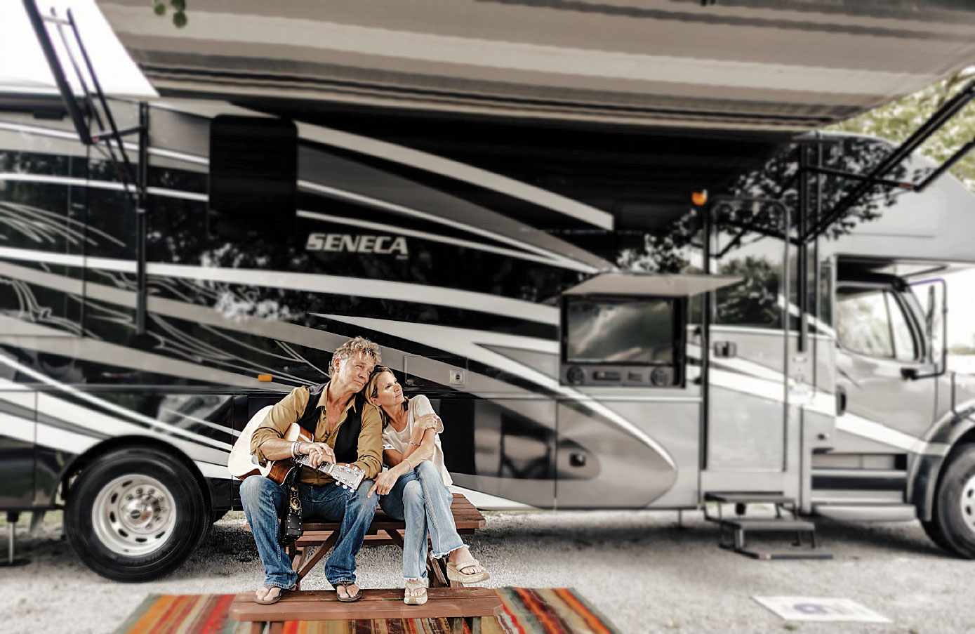 John Schneider with wife and RV